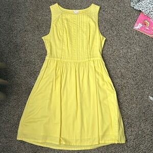 Yellow fit and flare dress with eyelet details